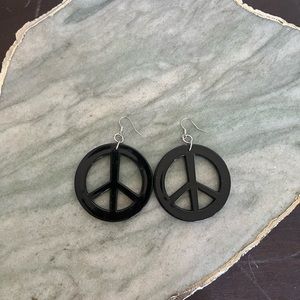 Peace sign earrings.
